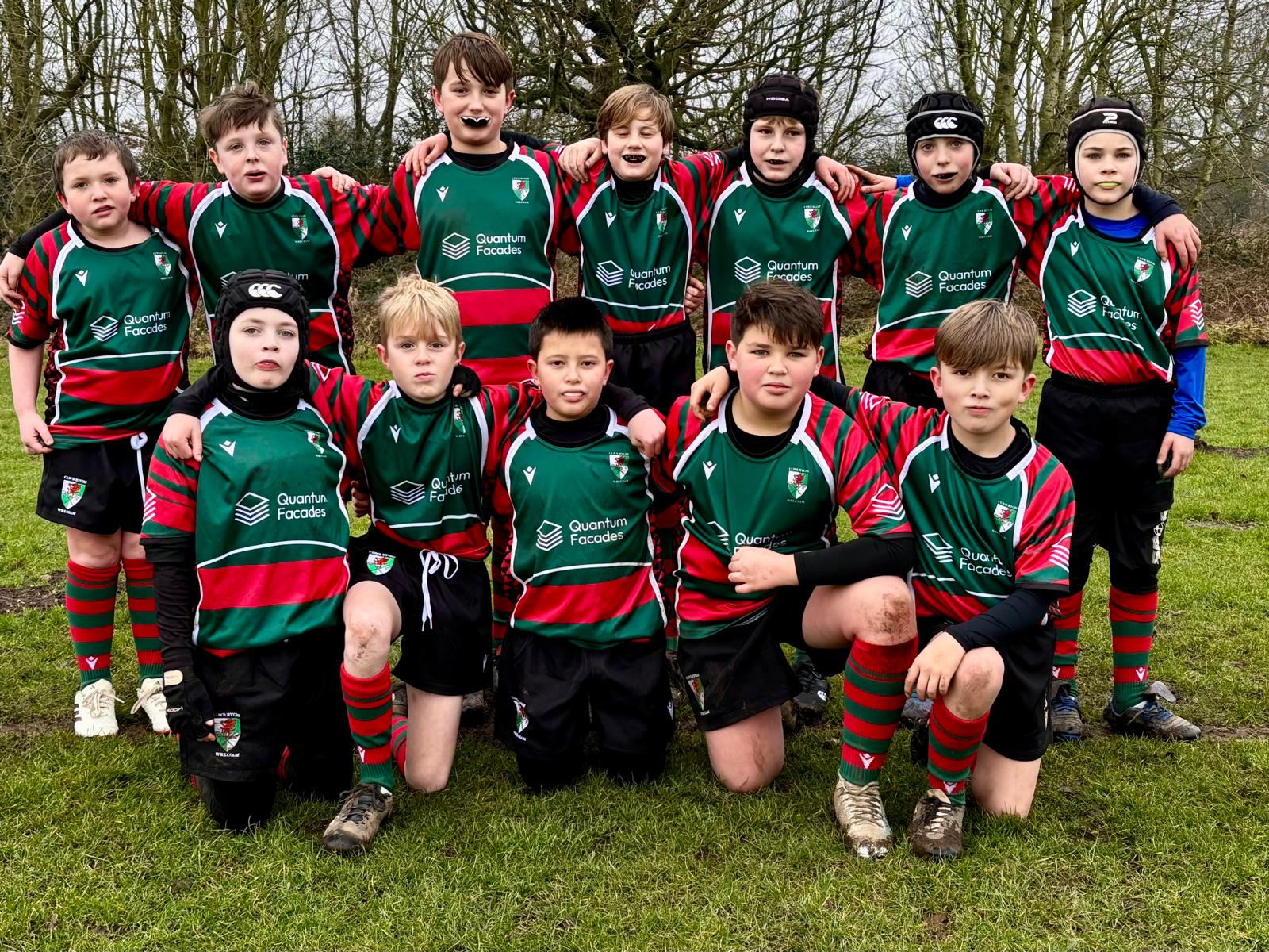 Wrexham Rugby Club Minis and Juniors U11s team in their sponsored kits