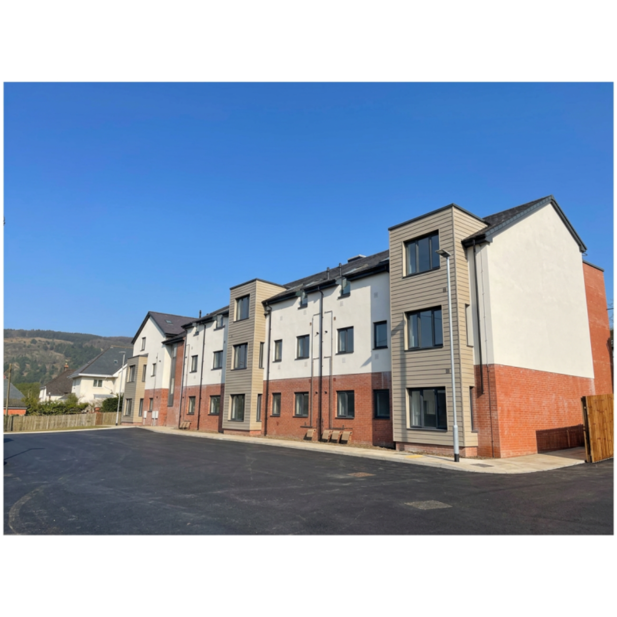 External wall insulation render system on a residential block