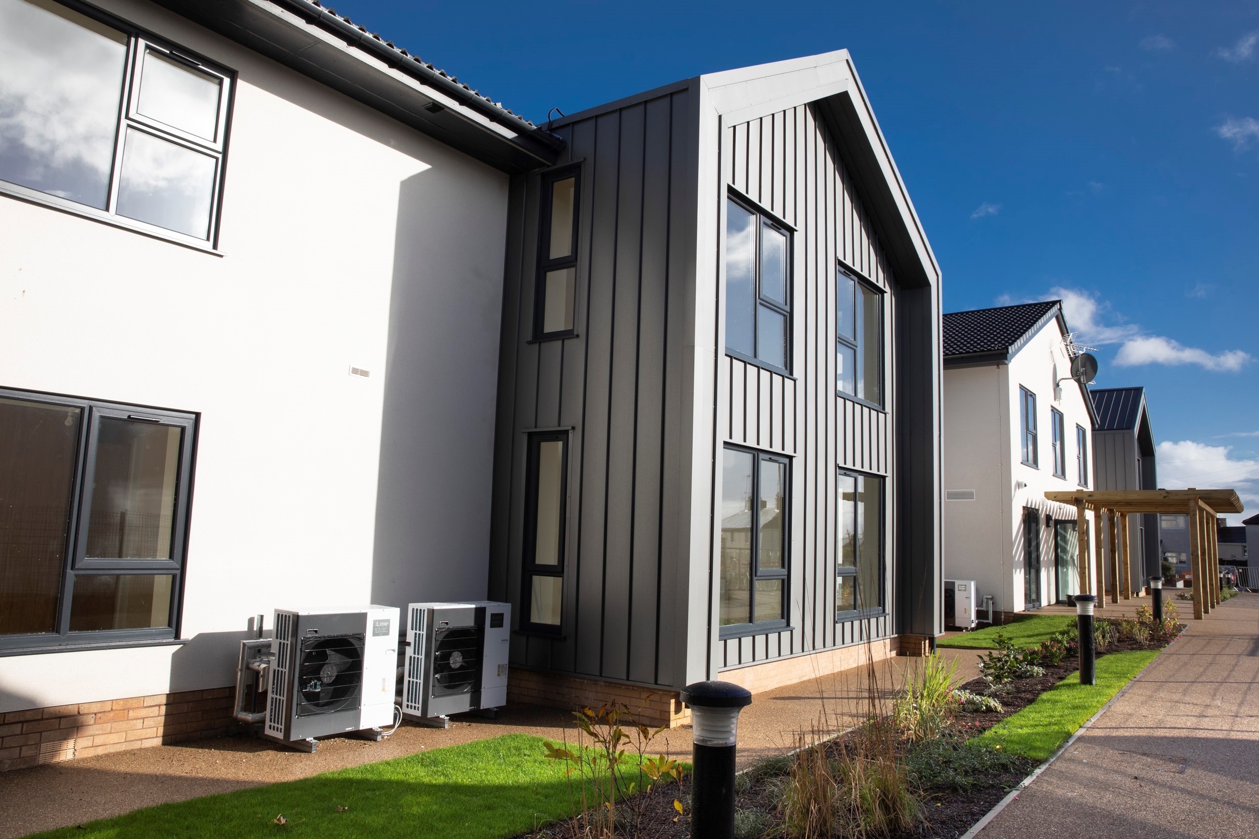 Wisteria Court insulated render refurbishment in Wrexham
