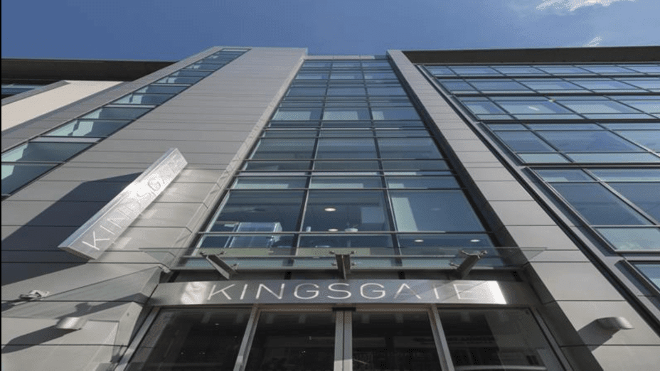 High-rise tower featuring glass and metal curtain wall facade